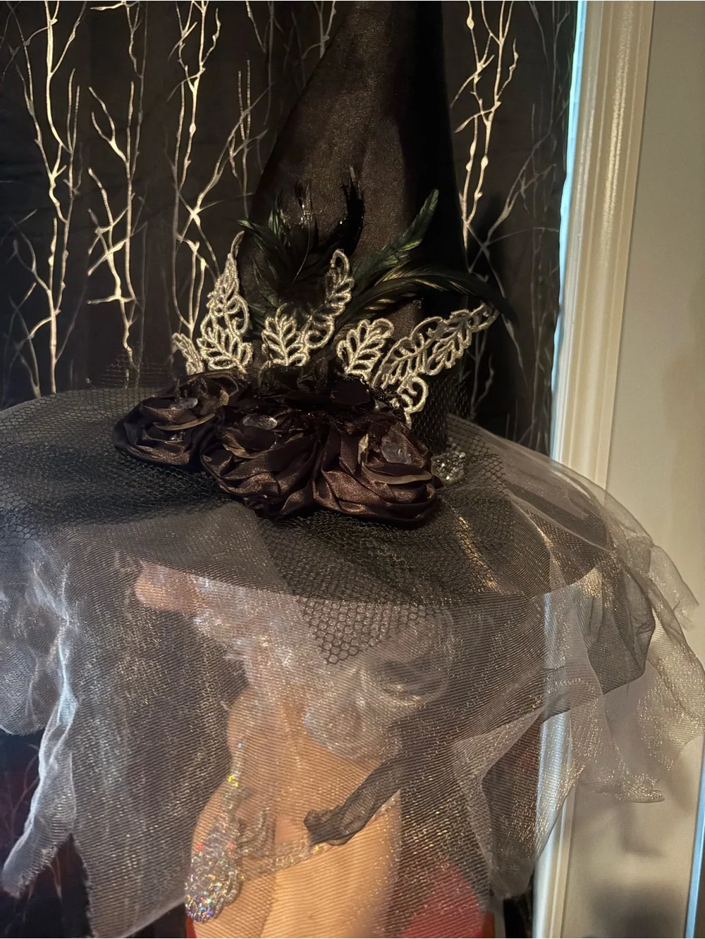 Elegant Black Witch Hat with Veil and Floral Accents unique embellishments